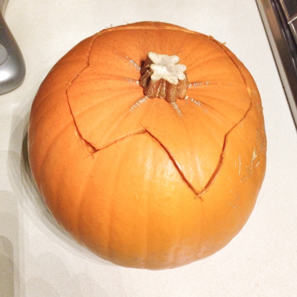carving a halloween pumpkin